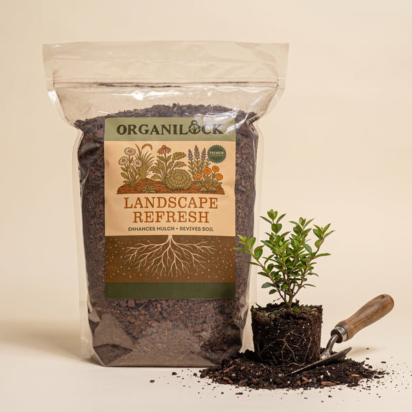 OrganiLock Landscape Refresh bag beside a young shrub and a garden trowel
